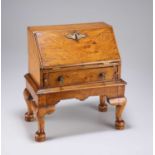 AN 18TH CENTURY STYLE OAK MINIATURE BUREAU