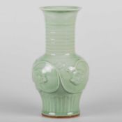 A CHINESE YUAN/MING STYLE MOULDED CELADON VASE