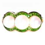 A GREEN GARNET AND PEARL TRIPLE CLUSTER RING