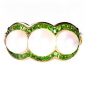 A GREEN GARNET AND PEARL TRIPLE CLUSTER RING