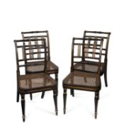 A SET OF FOUR REGENCY PARCEL-GILT AND CANEWORK SIDE CHAIRS
