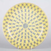 A CHINESE YELLOW-GROUND BLUE-DECORATED 'SHOU' PLATE, QING DYNASTY, TONGZHI MARK, 19TH CENTURY
