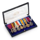 A SET OF SEVEN MINIATURE MEDALS