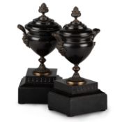 A PAIR OF 19TH CENTURY BLACK SLATE AND BRONZE-MOUNTED CLASSICAL URNS