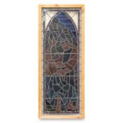 A LARGE STAINED AND LEADED GLASS PANEL