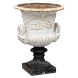 A VICTORIAN PAINTED CAST IRON URN