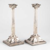 A PAIR OF GEORGE III SILVER COLUMNAR CANDLESTICKS