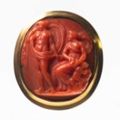 A LARGE CORAL CAMEO RING