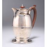 A GEORGE V SILVER HOT WATER JUG