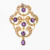 A LATE VICTORIAN AMETHYST AND SEED PEARL BROOCH / PENDANT