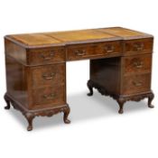 A GEORGIAN STYLE WALNUT DESK, CIRCA 1920