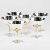 A SET OF SIX ELIZABETH II PARCEL-GILT SILVER COCKTAIL CUPS
