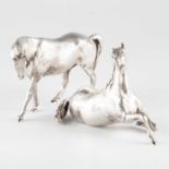 A PAIR OF ELIZABETH II CAST SILVER MODELS OF HORSES