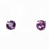 A PAIR OF 18 CARAT WHITE GOLD SOLITAIRE PINK SAPPHIRE STUD EARRINGS