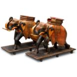 A PAIR OF KASHMIRI POLYCHROME WOODEN ELEPHANTS, 19TH CENTURY