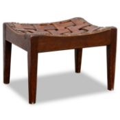 ARTHUR SIMPSON OF KENDAL, AN ARTS AND CRAFTS OAK AND LEATHER STOOL