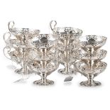 A SET OF TWELVE GEORGE V SILVER SUNDAE DISHES