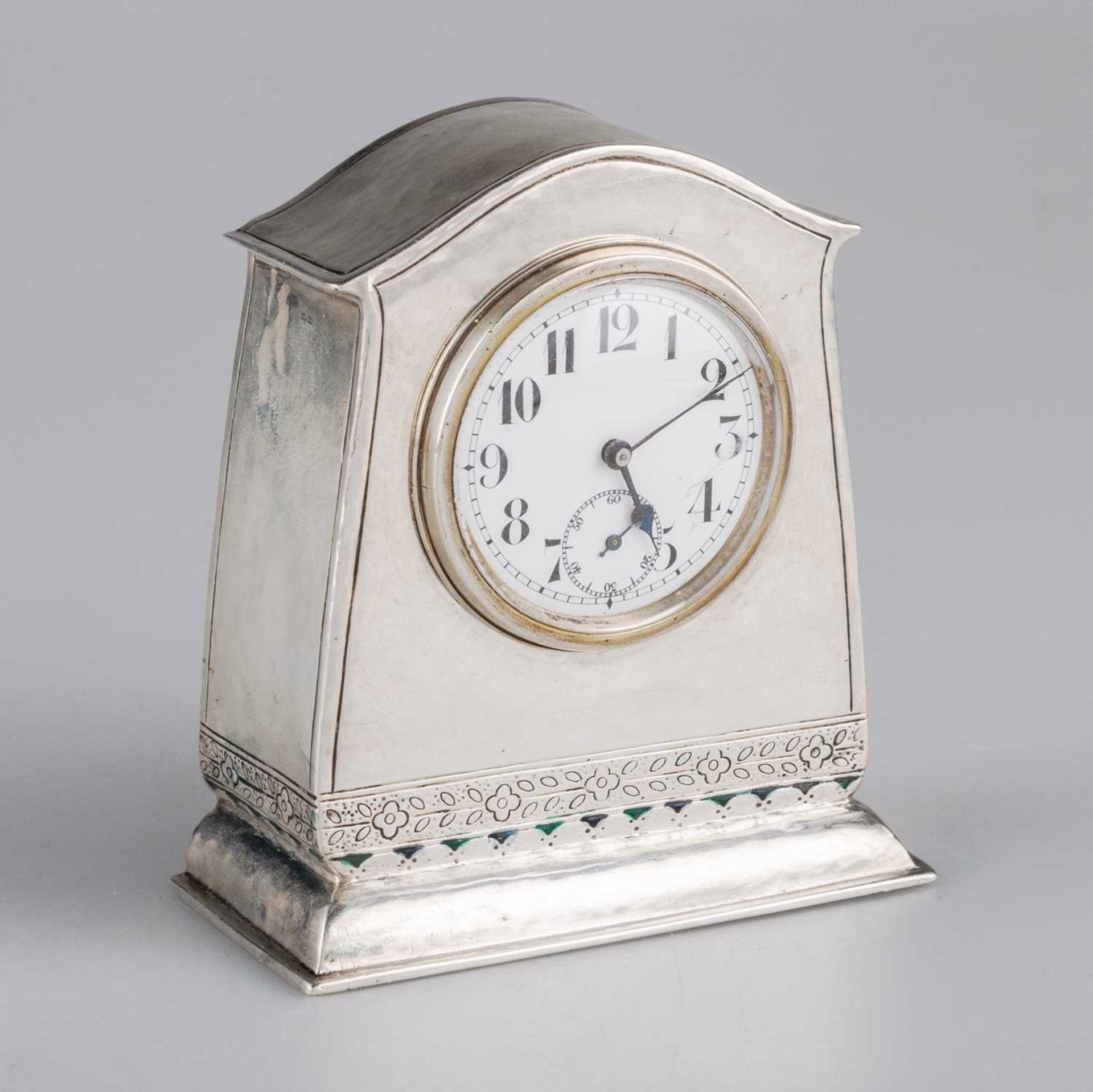 AN ARTS AND CRAFTS SILVER AND ENAMEL CLOCK