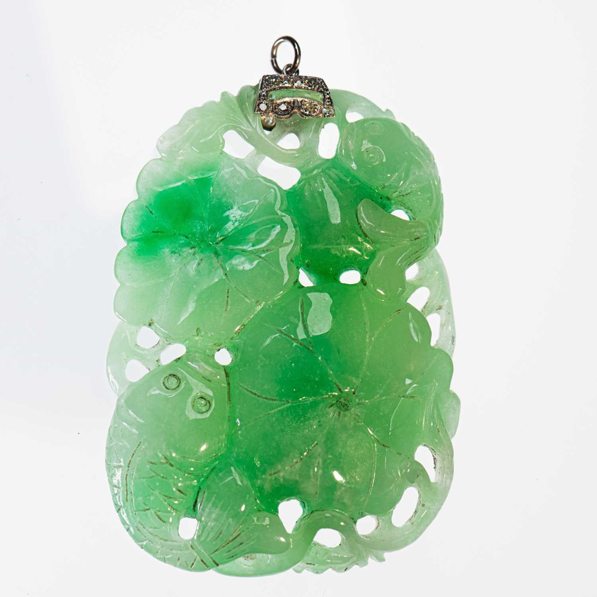 A LARGE JADE KOI CARP AND LOTUS PENDANT