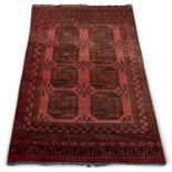 AN AFGHAN RUG