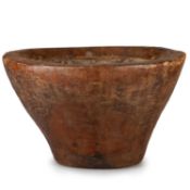 A LARGE TREEN DUG-OUT BOWL
