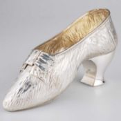 A LATE VICTORIAN SILVER MODEL OF A SHOE