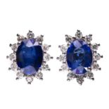 A PAIR OF SAPPHIRE AND DIAMOND CLUSTER EARRINGS