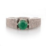 A SOLITAIRE EMERALD RING