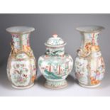 A LARGE PAIR OF CANTONESE FAMILLE ROSE VASES, 19TH CENTURY