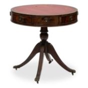 A REGENCY STYLE LEATHER-INSET MAHOGANY DRUM TABLE