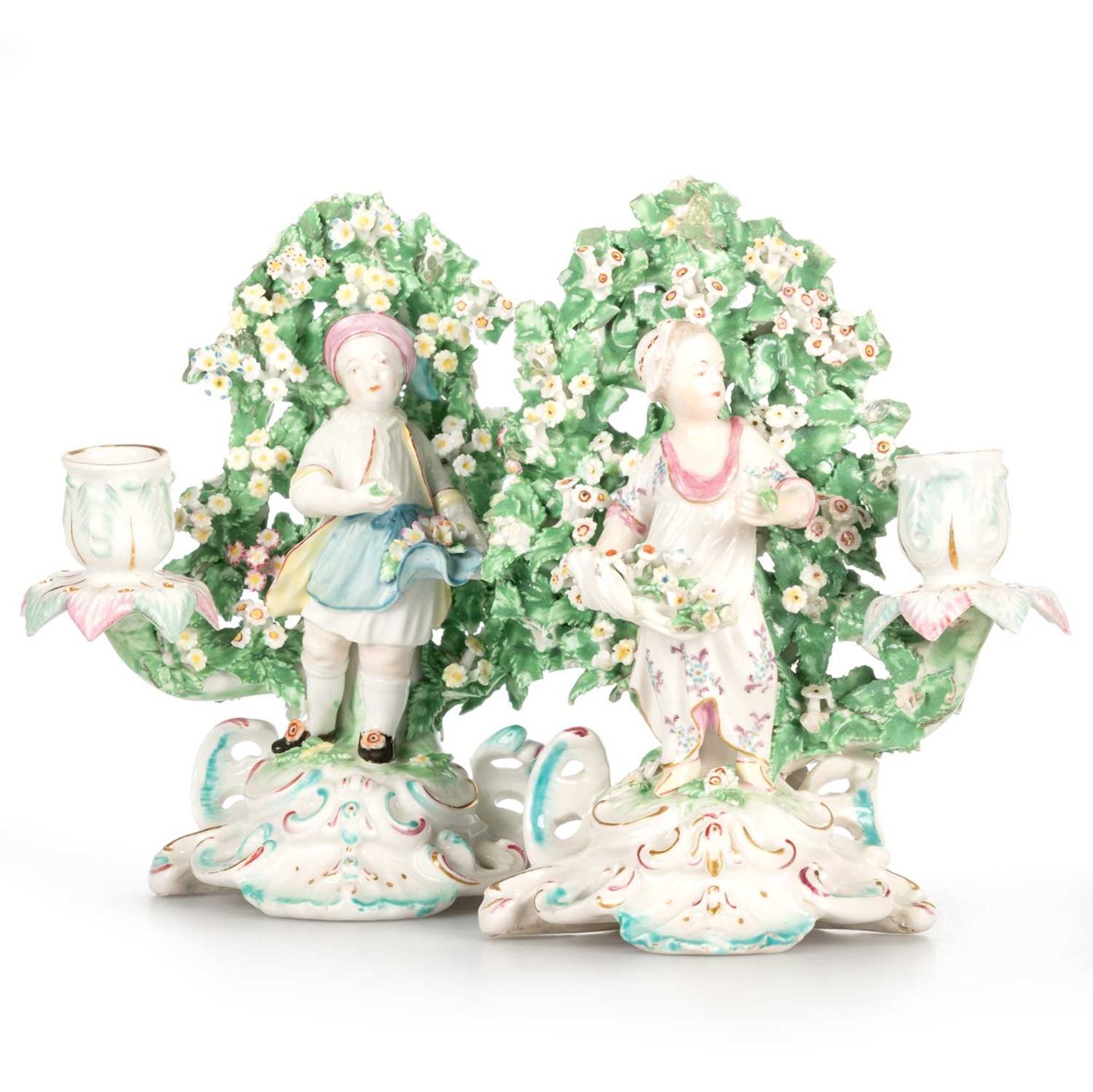 A PAIR OF DERBY PORCELAIN BOCAGE CANDLESTICKS, CIRCA 1765