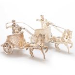 A PAIR OF ELIZABETH II SILVER MODELS OF CHARIOTEERS