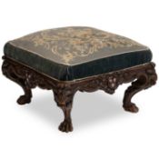A 19TH CENTURY PARTIALLY PAINTED OAK STOOL