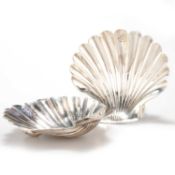 A PAIR OF GEORGE III SILVER BUTTER SHELLS