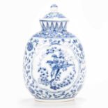 A CHINESE BLUE AND WHITE JAR AND COVER