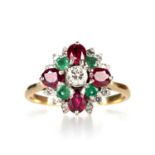 A DIAMOND, RUBY AND EMERALD CLUSTER RING