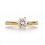 AN 18 CARAT GOLD SOLITAIRE DIAMOND RING