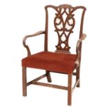 A GEORGE III MAHOGANY OPEN ARMCHAIR