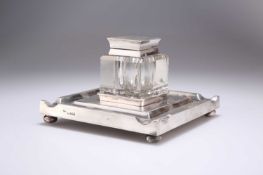 AN EDWARDIAN SILVER-TOPPED GLASS INKWELL ON STAND