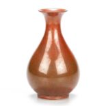 A CHINESE PORCELAIN PERSIMMON-GLAZED SMALL YUHUCHUNPING VASE