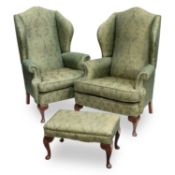 A PAIR OF GEORGIAN STYLE UPHOLSTERED WING-BACK ARMCHAIRS AND A FOOTSTOOL