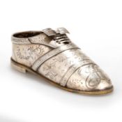 A HEAVY AND RARE RUSSIAN SILVER MODEL OF A SHOE