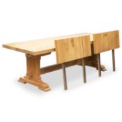 A LARGE CONTEMPORARY OAK DINING TABLE