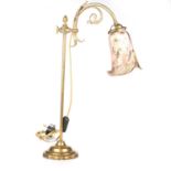 A LATE VICTORIAN BRASS ADJUSTABLE READING LAMP