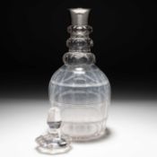 A GEORGE V SILVER-COLLARED AND CUT-GLASS DECANTER