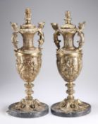 A LARGE PAIR OF BRONZE TABLE LAMPS