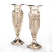 A PAIR OF EDWARDIAN SILVER VASES