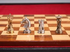 AN ELIZABETH II SILVER AND WOOD TRAVEL CHESS SET