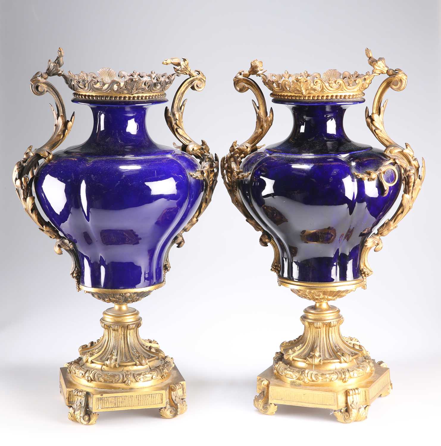 A PAIR OF LOUIS XV STYLE GILT-BRONZE MOUNTED PORCELAIN VASES, 19TH CENTURY