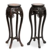 A PAIR OF CHINESE MARBLE-INSET HARDWOOD PLANTSTANDS, CIRCA 1900